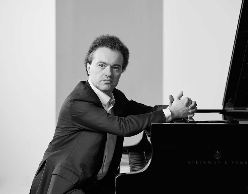 Famous Pianist at the piano in black and white