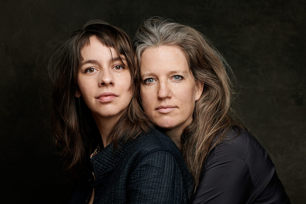 two beautiful woman headshot in studio