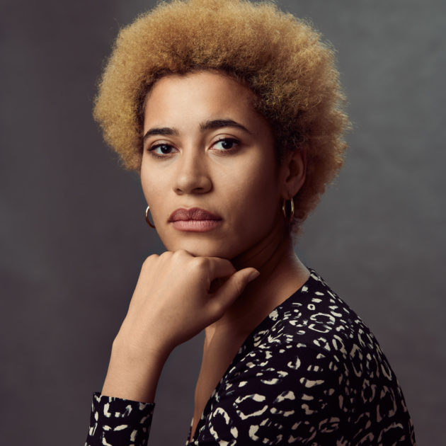 unbelievably beautiful woman in professional studio light